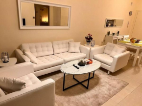 Modern Sunny 2 BR apartment, with pool and big yard